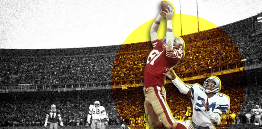 football player jumping to catch a pass