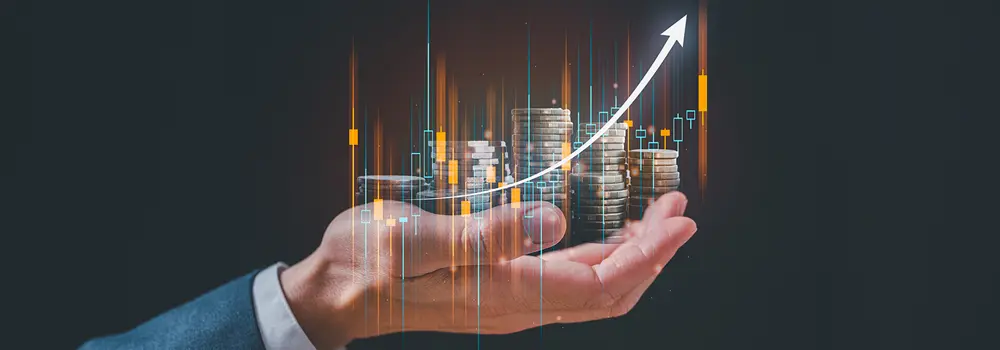 investing image of hand holding coins