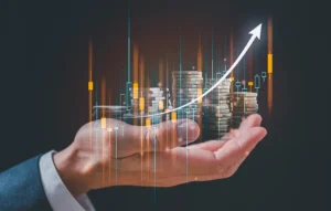 investing image of hand holding coins