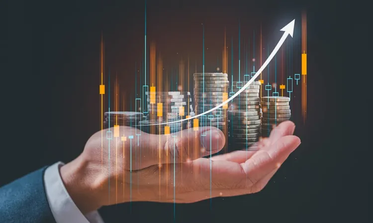 investing image of hand holding coins